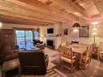 Spacious living area with Smart TV and exit to private grilling and dining patio